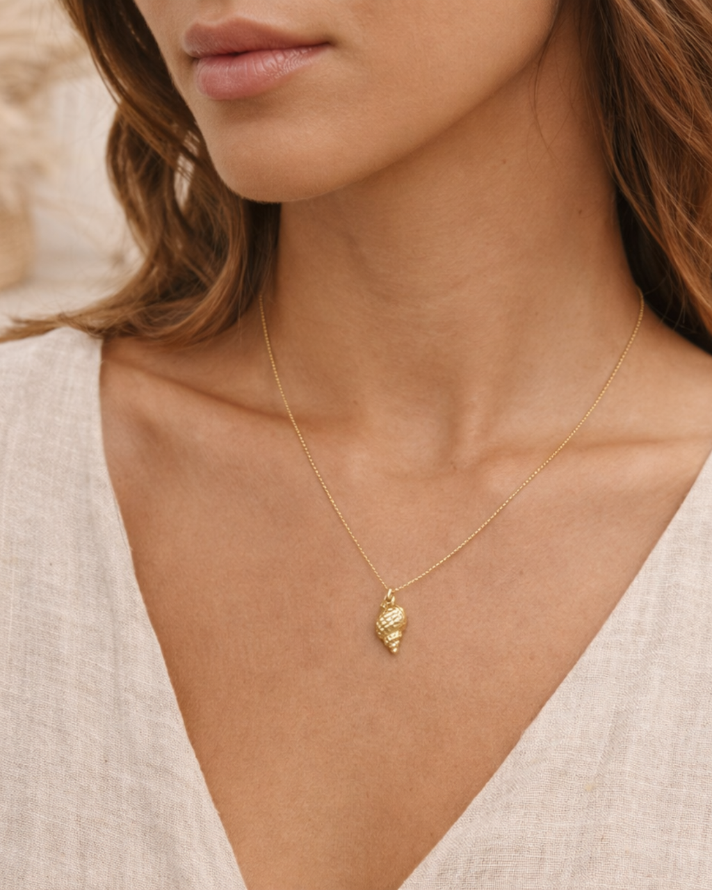 Colgante Caracola de Mar en Oro Amarillo 18 kt