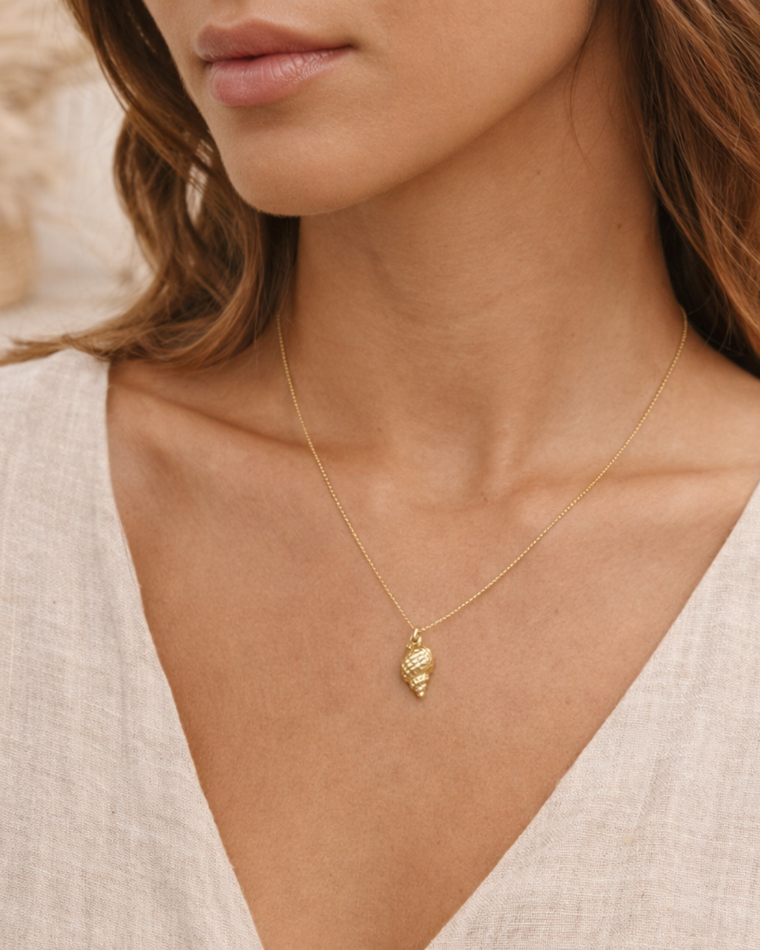 Colgante Caracola de Mar en Oro Amarillo 18 kt