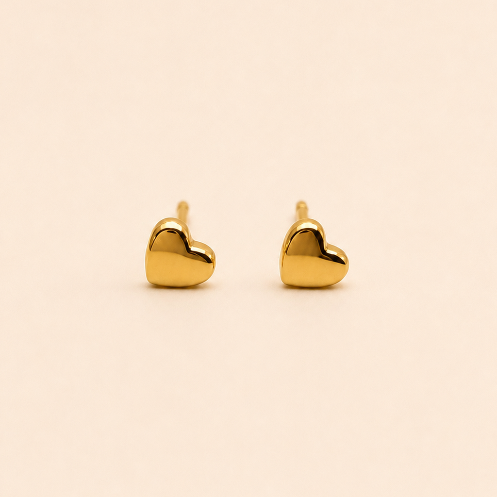 Aros de bebé corazón 18k