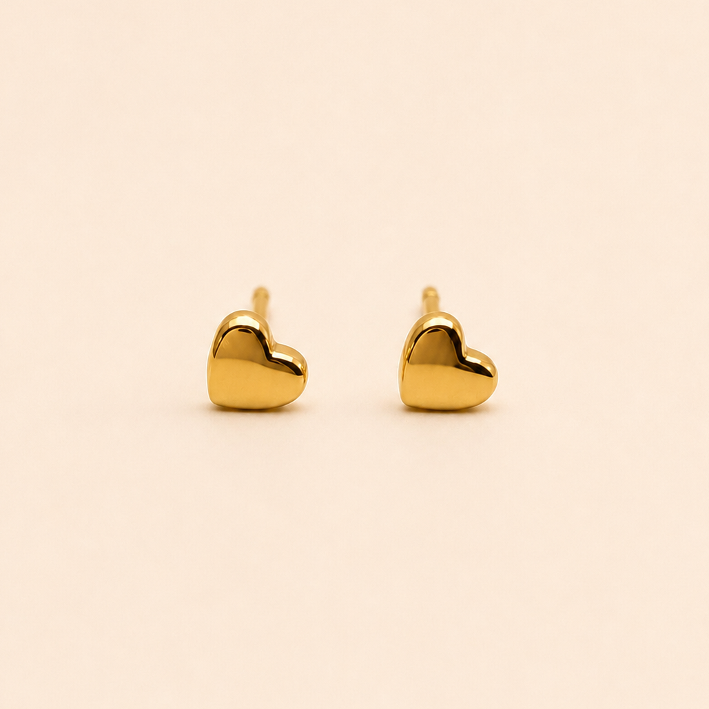 Aros de bebé corazón 18k