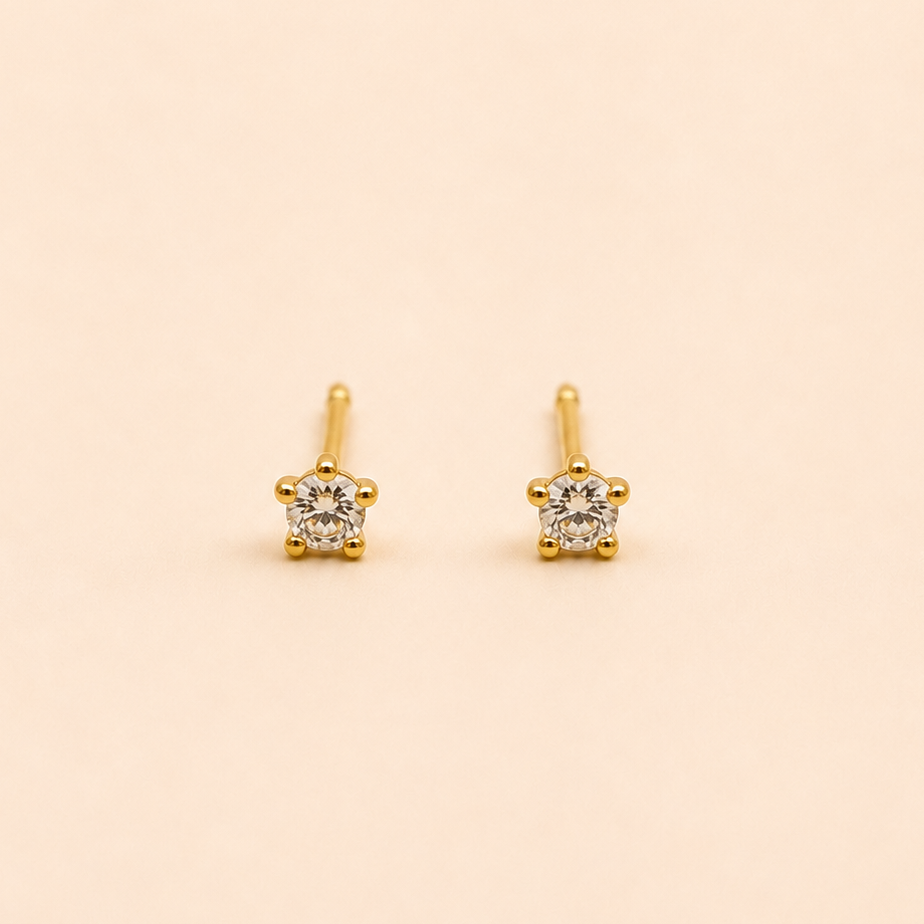 Aros de bebé con diamante en oro 18k