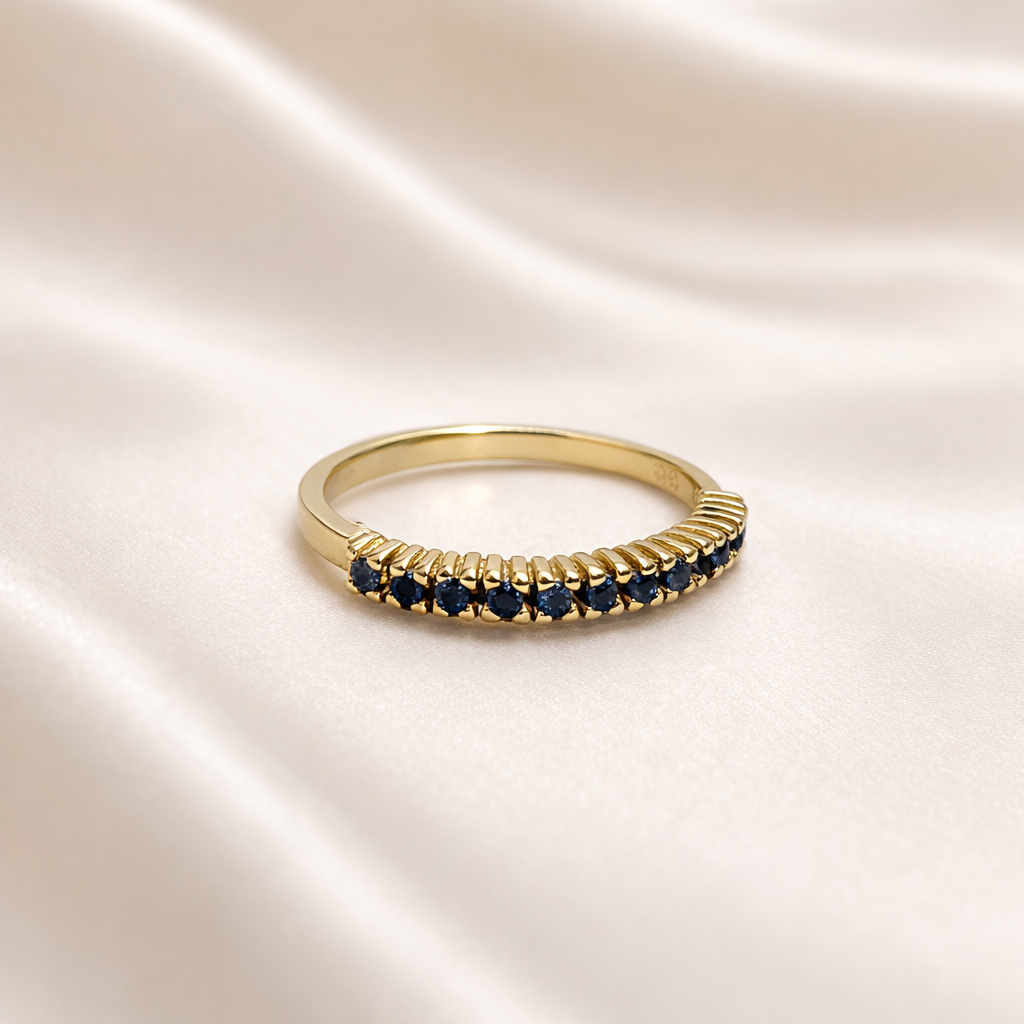 Anillo cintillo oro amarillo grifas circones azules