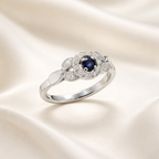 Anillo Halo Zafiro y Brillantes Gotas en Oro Blanco Paladio 18k