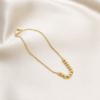Pulsera de pelotitas de oro amarillo 18kt