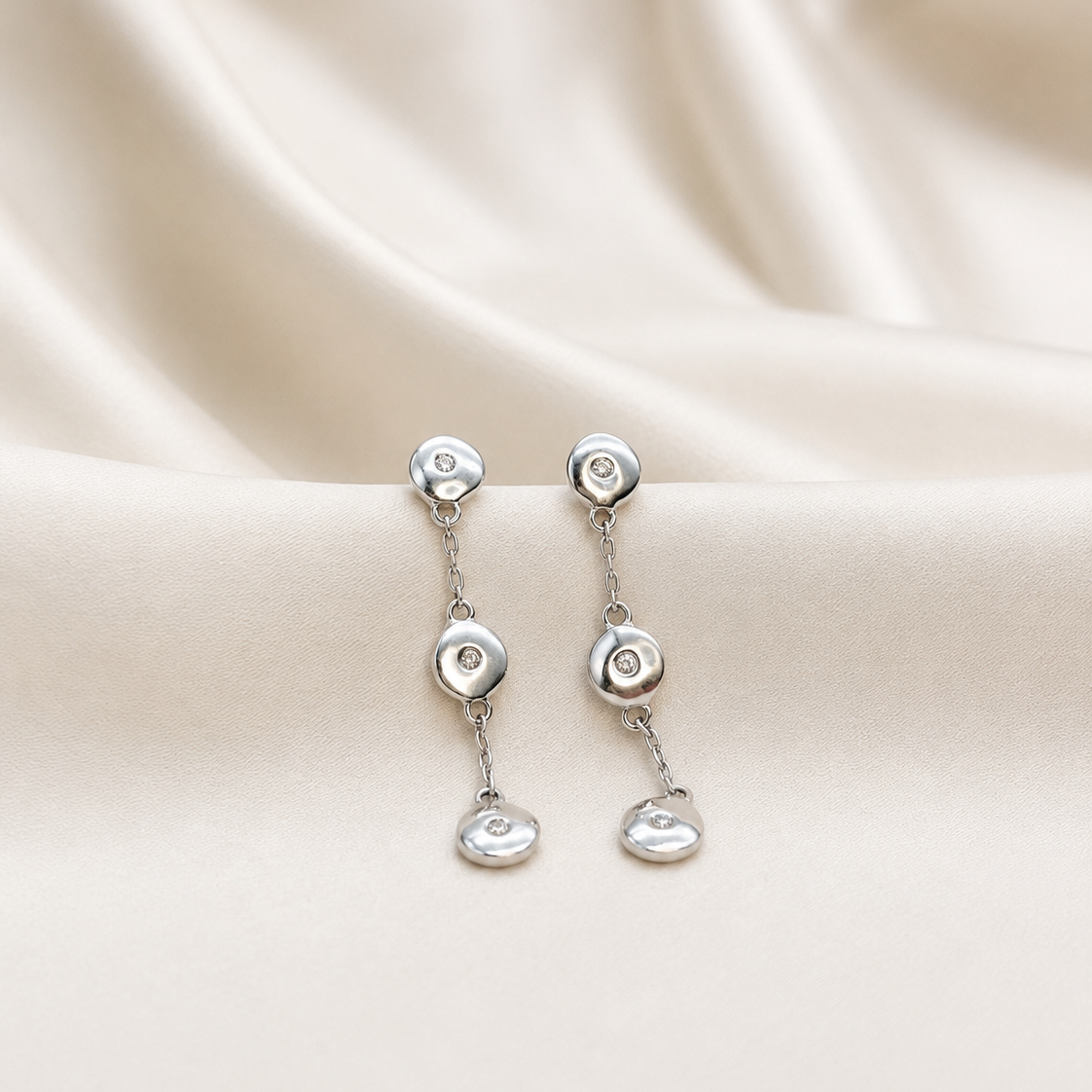 Aros Lentejas de Luz en Oro Blanco 18k