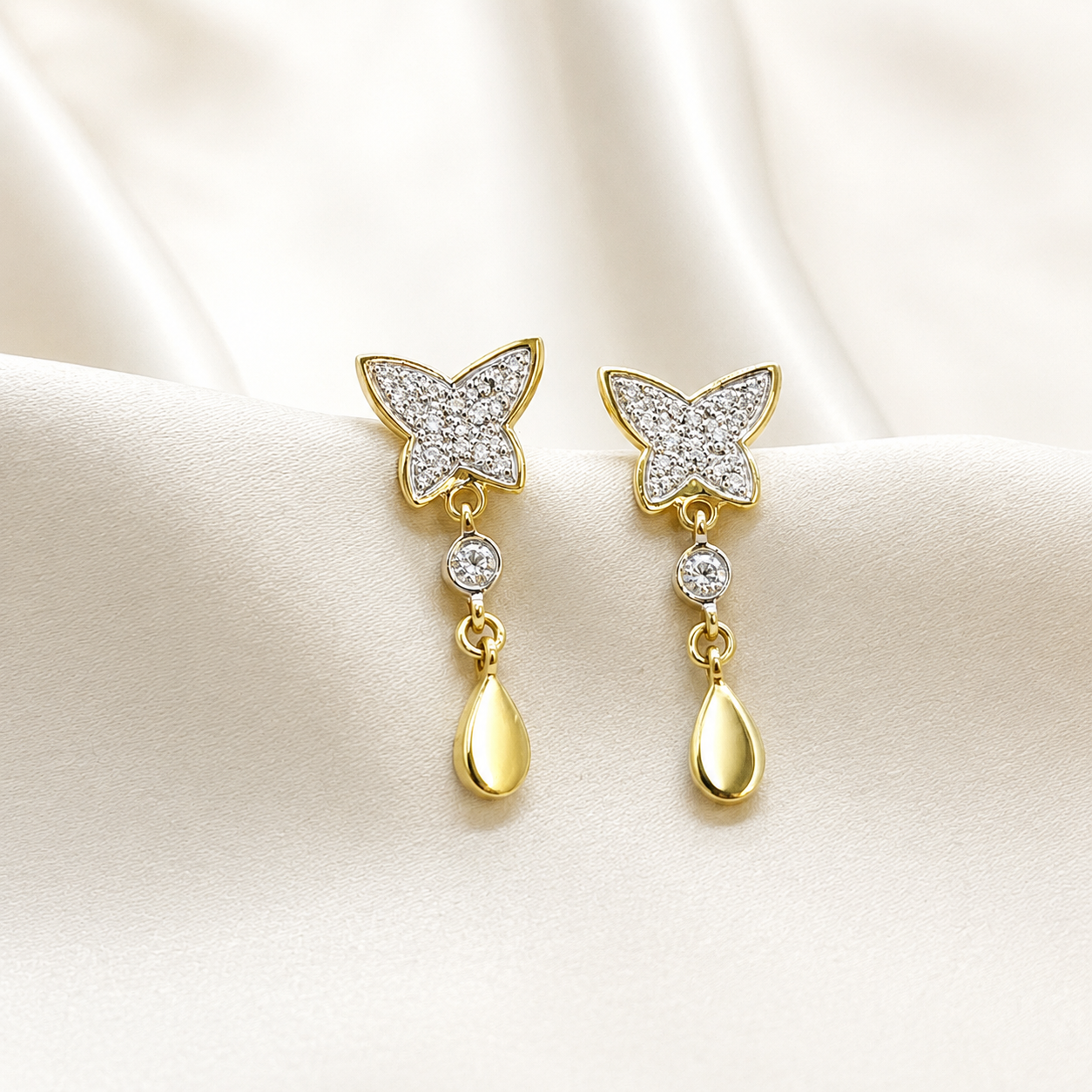 Aros Mariposa & Destellos en Oro Amarillo 18k