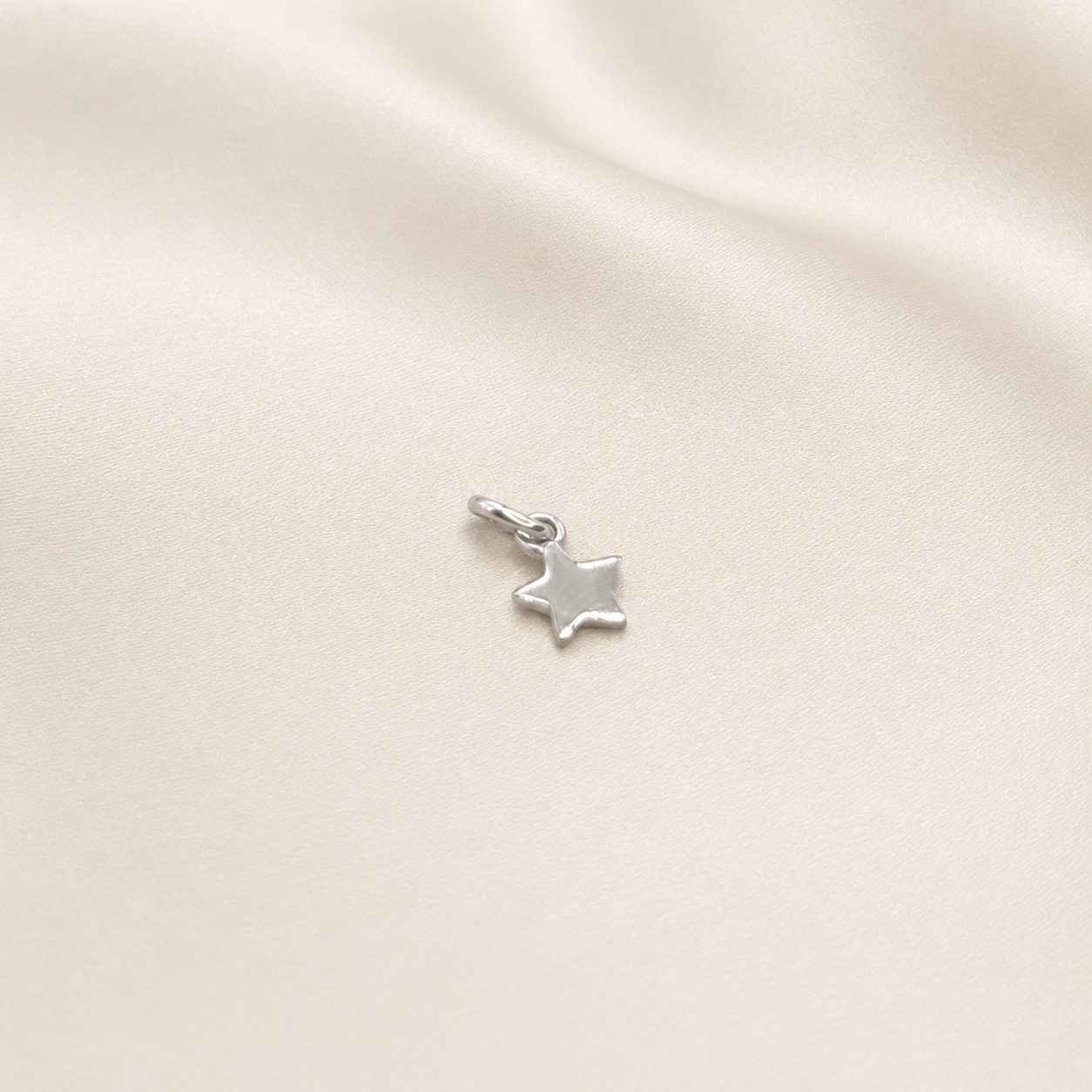 Colgante Estrellita en Oro Blanco 18k
