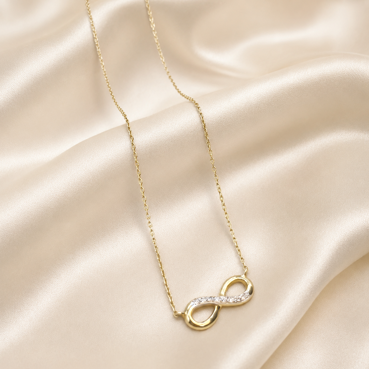 Collar Infinito con Circones en Oro Amarillo 18k