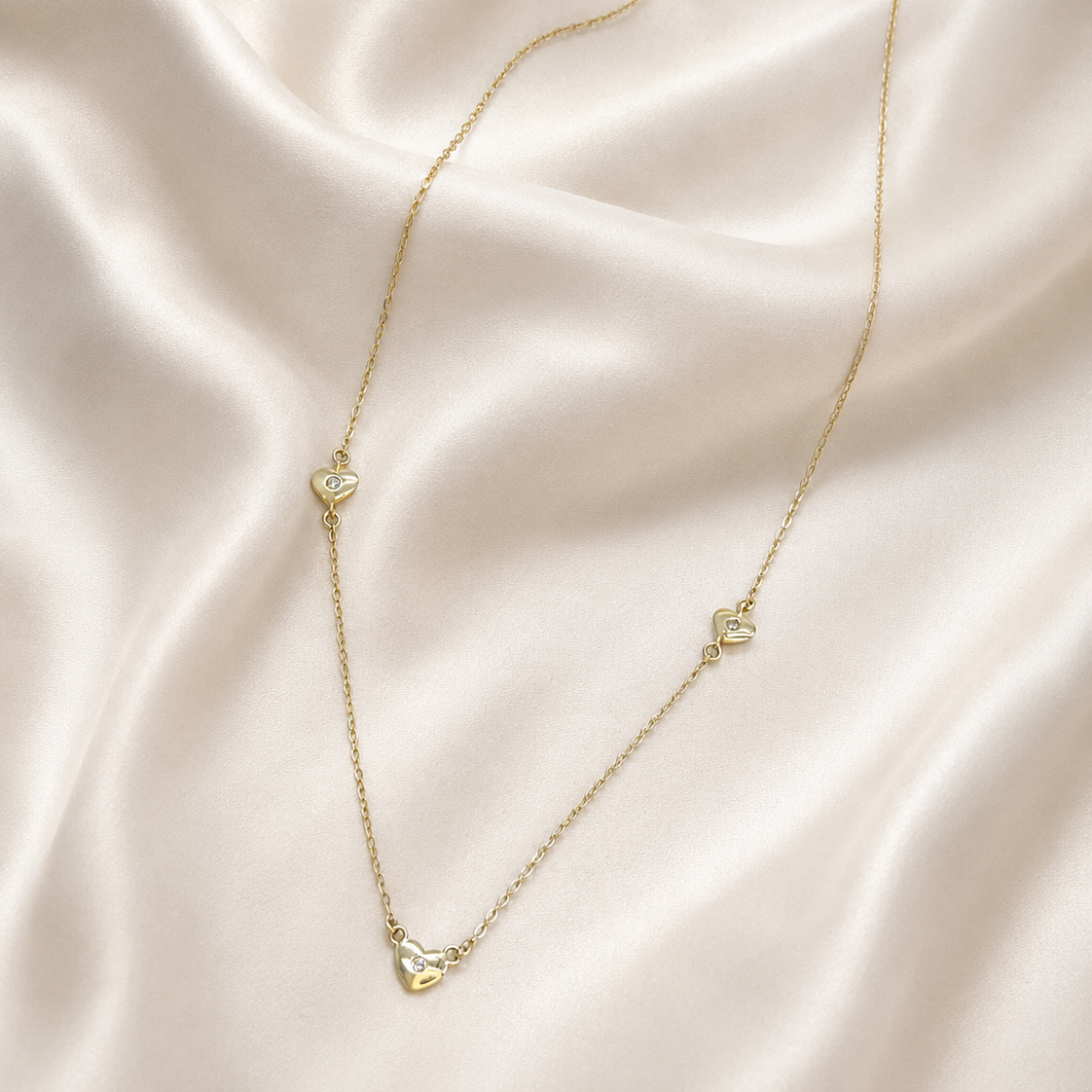 Collar Trío de Corazones con Brillantes en Oro Amarillo 18k