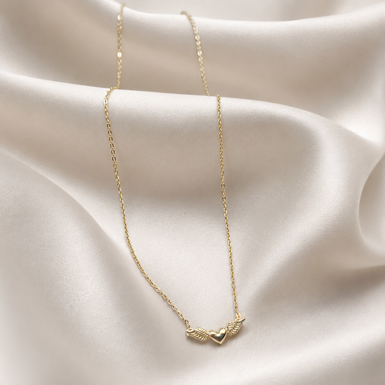Collar Corazón Alado en Oro Amarillo 18k