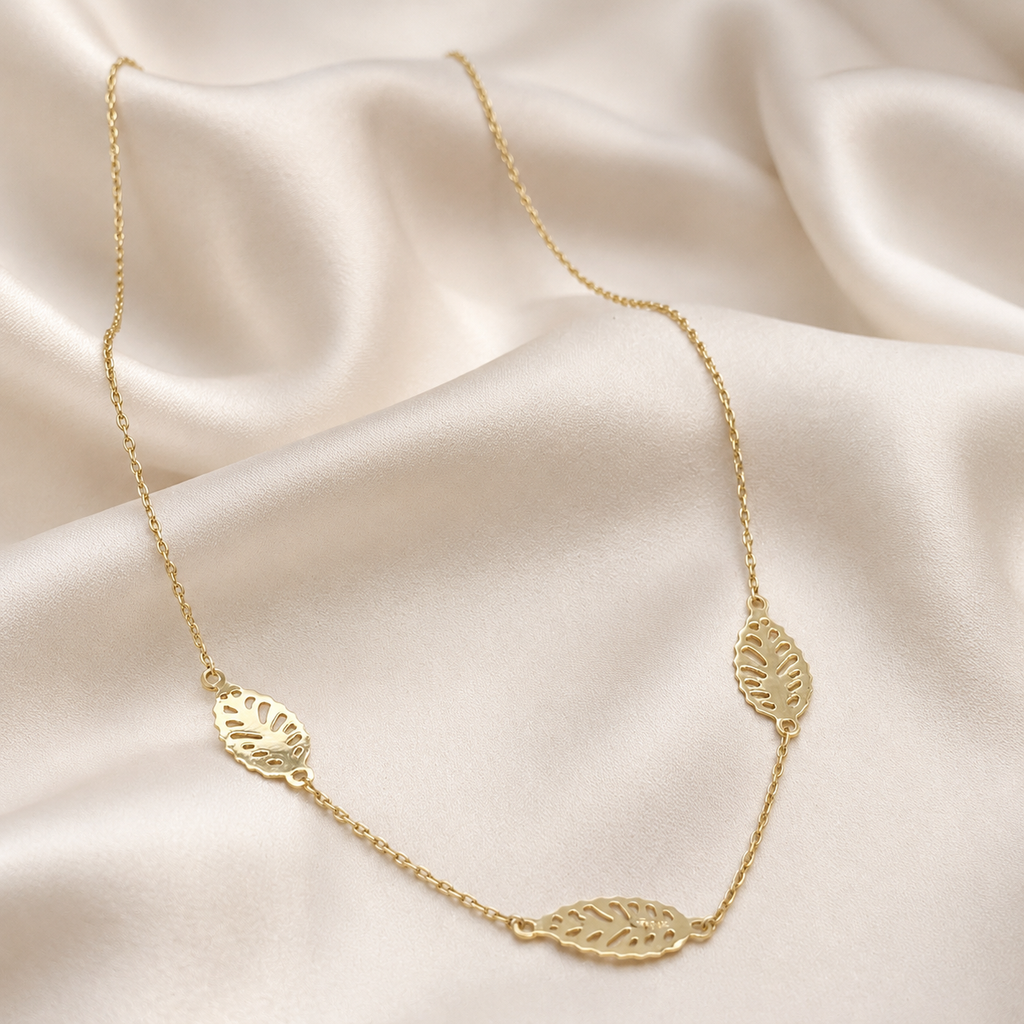 Collar Trío de Hojas Caladas en Oro Amarillo 18k
