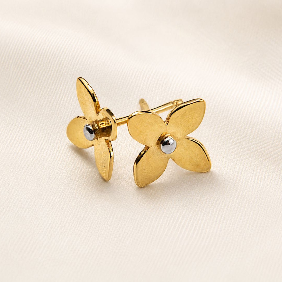 Aro Flor Oro 18K con centro rodinado